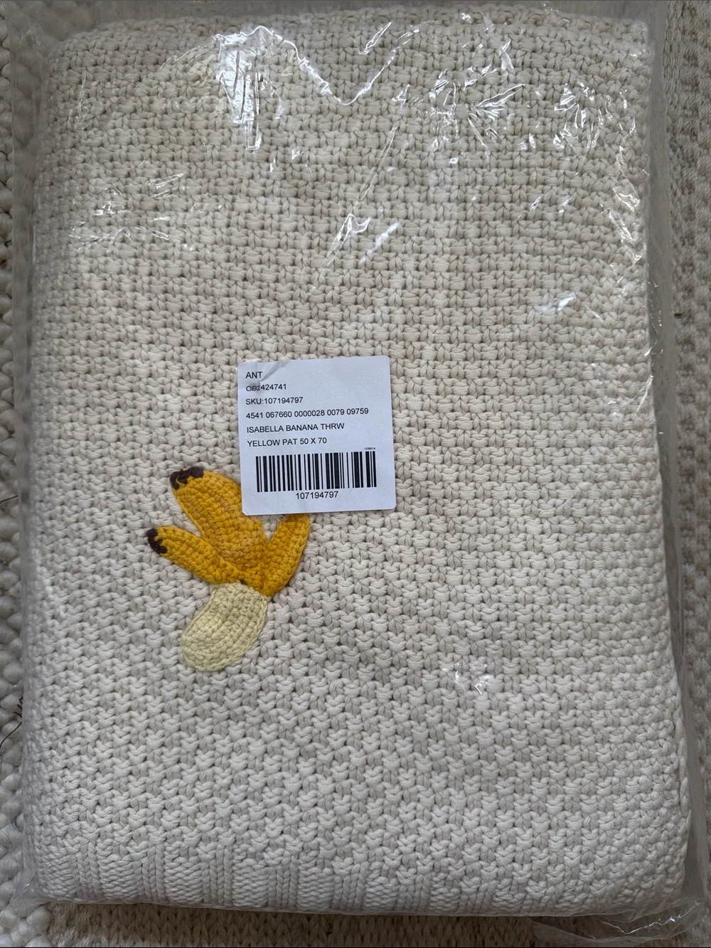 Isabella Cotton Knit Icon Banana Throw Blanket from Anthropologie